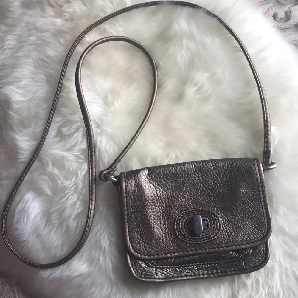 Fossil cross body copper color